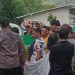 Di Guyur Hujan, Erna Giasi Hadapi Masa Aksi